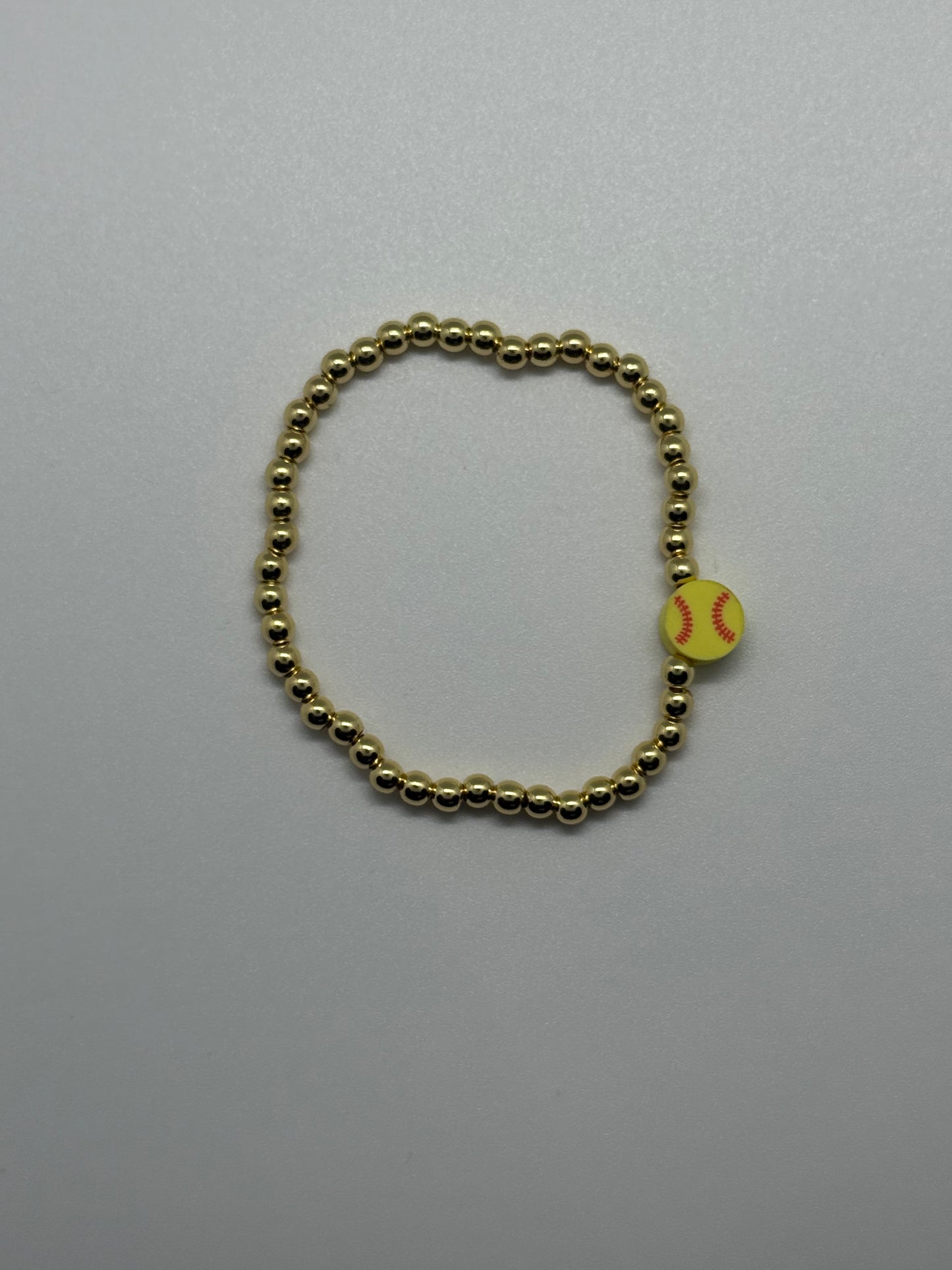 Gold softball beaded bracelet