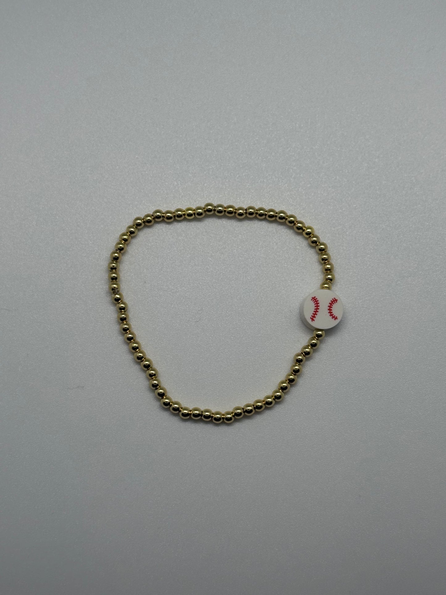 Gold beaded baseball bracelet
