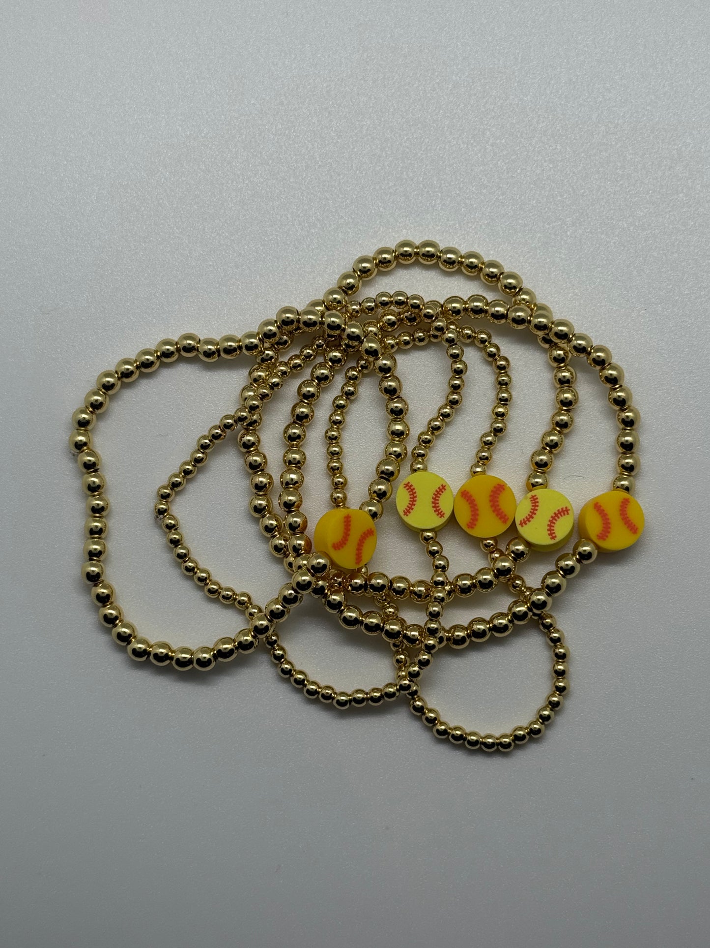 Gold softball beaded bracelet